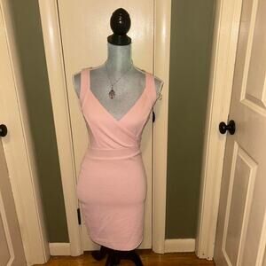 Pink bodycon dress with crisscross